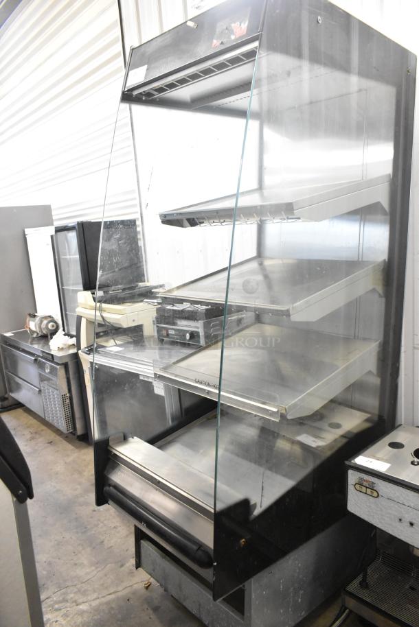 BKI HSS2-4T commercial 3-tier heated merchandiser with open design on casters, 208V, 1 phase. Clean and functional.