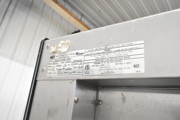 BKI HSS2-4T metal merchandiser showing label details. Model HSS2-4T, 208 volts, 1 phase, NSF and Intertek certified.