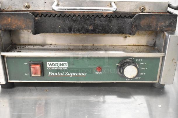 Waring WPG250 Stainless Steel Panini Press, commercial grade, visible wear; 120V, 1 Phase, temperature dial, power switch.