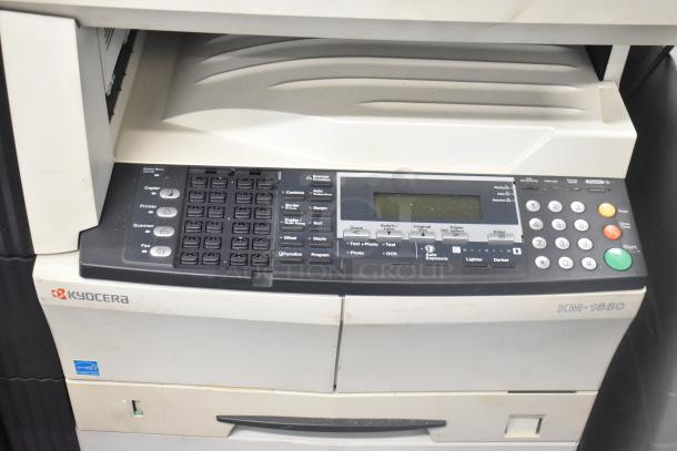 Kyocera AGK3 floor copier printer scanner, model KM-1650. Features keypad, display screen. Good condition with minor wear.