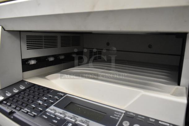 Kyocera AGK3 floor style copier printer scanner, keypad and tray visible, slight wear, in working condition.