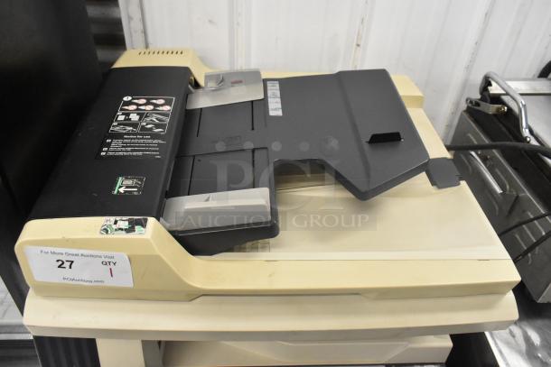Kyocera AGK3 floor-style copier, printer, scanner. Features include input tray, label "27 Qty 1" visible on beige panel.