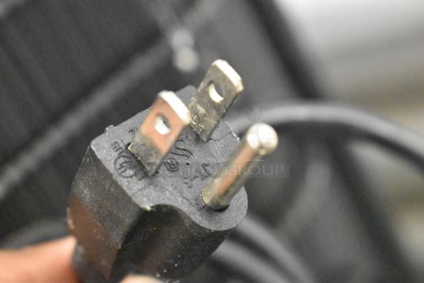 Cecilware CTR3.75 mini cooler power plug detail, showcasing 110-120V compatibility and standard prong design.