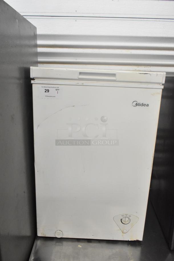 Midea MRC04M3AWW Chest Freezer, used, 115V, 1 phase, white exterior with minor wear, brand label visible.