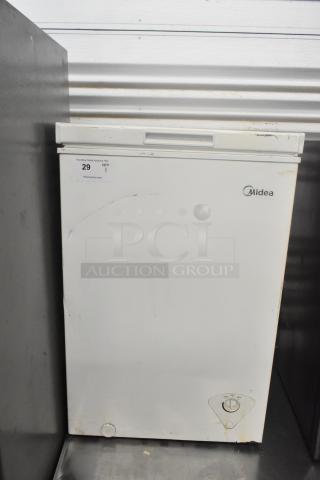 Midea MRC04M3AWW Chest Freezer, used, 115V, 1 phase, white exterior with minor wear, brand label visible.