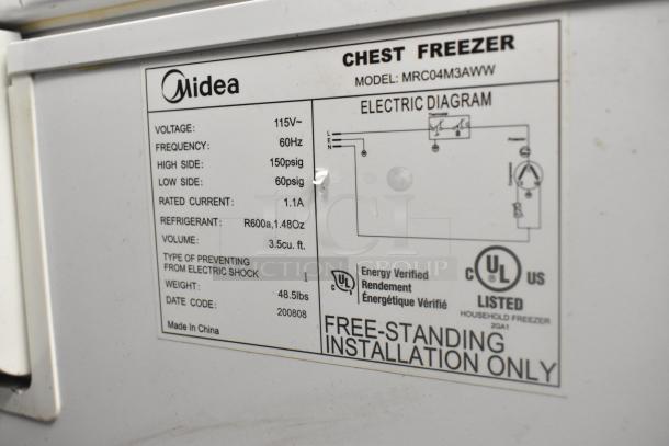 Midea MRC04M3AWW Chest Freezer label showing voltage, frequency, and refrigerant details. 3.5 cu. ft. capacity.