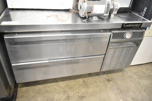 Continental DL48G stainless steel 2-drawer chef base on commercial casters. Features 115V, 1 phase, used condition.