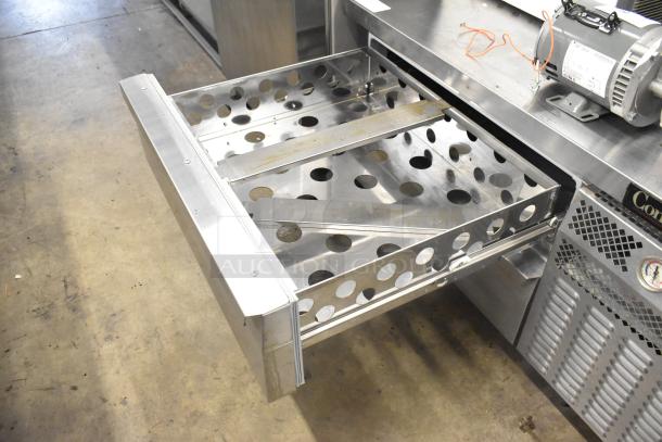 Continental DL48G stainless steel 2-drawer chef base with commercial casters. Includes motor and vented panel. Good condition.