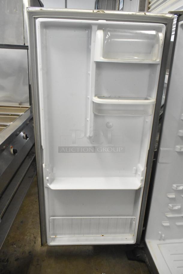 2019 Whirlpool WSZ57L18DM03 single door reach-in freezer. White interior shelves, 115 volts, 1 phase, good condition.