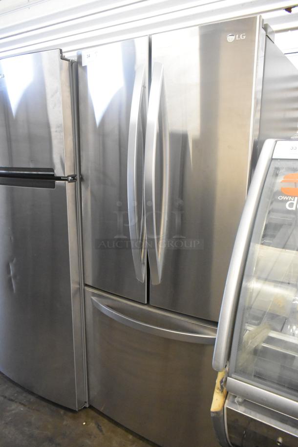 LG LFCS22520S stainless steel refrigerator, French doors, bottom freezer drawer, 115V, 1 phase, auction item condition shown.