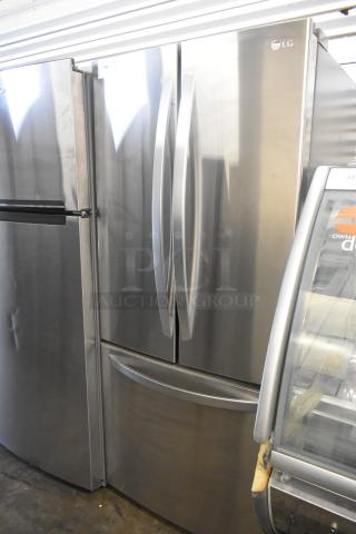 LG LFCS22520S stainless steel refrigerator, French doors, bottom freezer drawer, 115V, 1 phase, auction item condition shown.