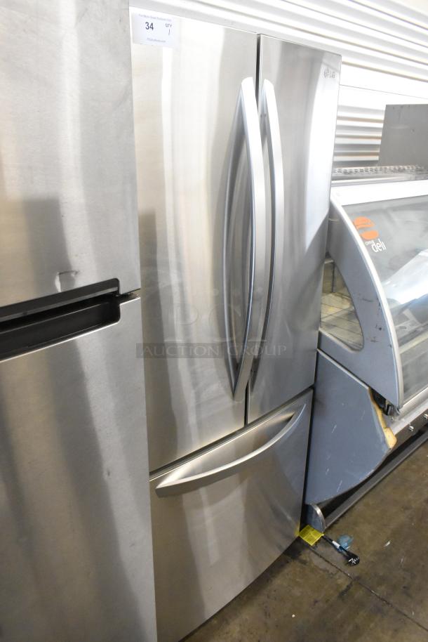 LG LFCS22520S stainless steel French door refrigerator with freezer drawer, 115V, in good condition. Model tag visible.
