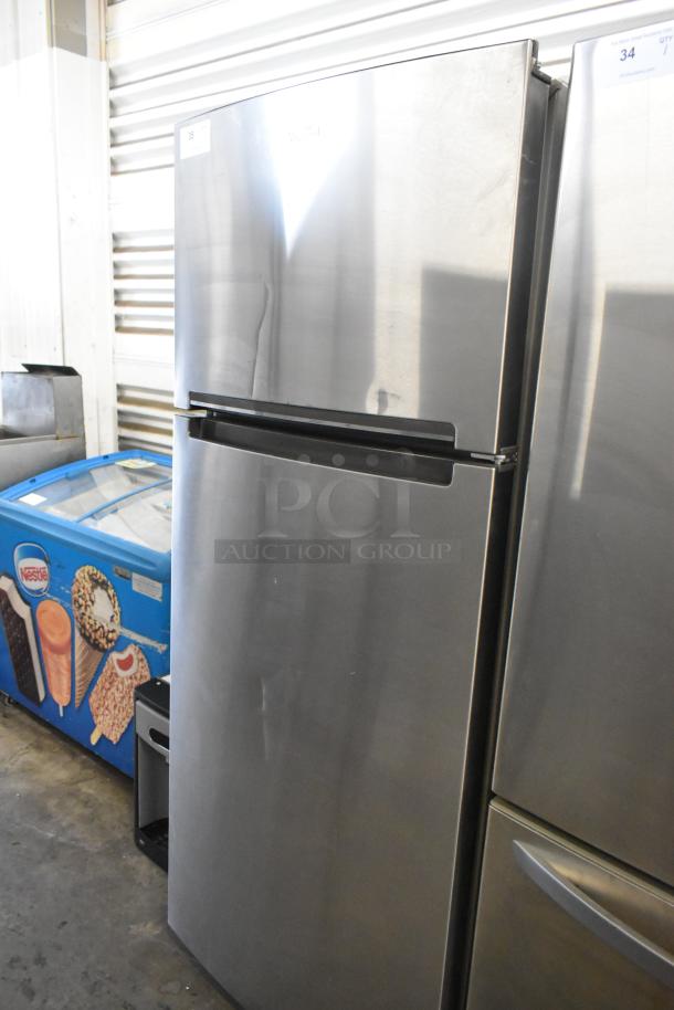 2016 Whirlpool WRT518SZFM00 stainless steel fridge with freezer, 115V, 1 Phase, light scuff marks visible.
