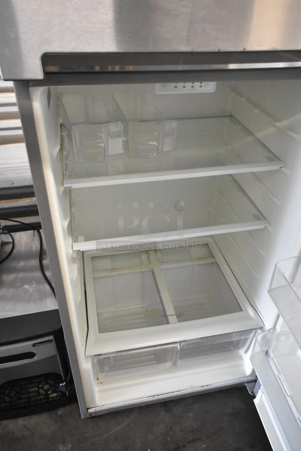 2016 Whirlpool WRT518SZFM00 stainless steel fridge with freezer, clean interior, glass shelves, 115V, 1 phase.