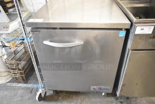 Ikon IUC28R stainless steel single door undercounter freezer on casters, 115V, 1-phase, commercial use, good condition.