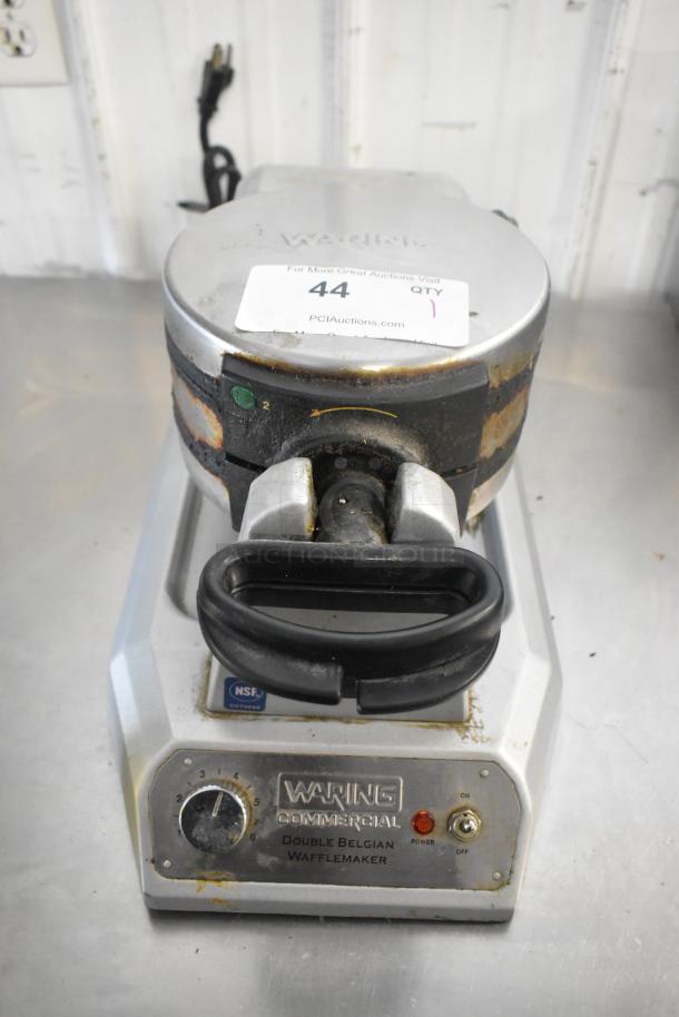 Waring WW200 metal countertop waffle maker, 120 volts, used condition with visible wear and rust, NSF certified.