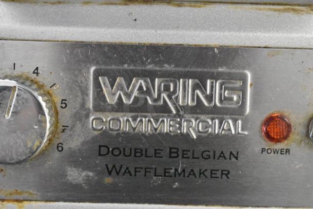 Waring WW200 Metal Countertop Waffle Maker, visible wear, 120V, commercial double Belgian waffles, power indicator.