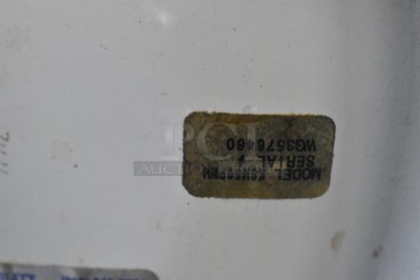 KitchenAid KSM5OP model label on metal countertop dough mixer, showing serial number WG3578460, 115V, 1 phase.