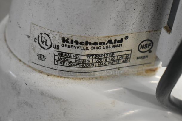 KitchenAid KM25G mixer label showing model, serial number, 120 volts, 450 watts, and NSF certification details.