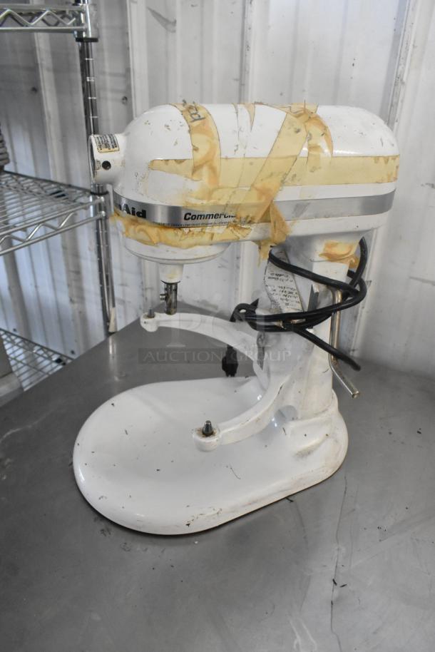 KitchenAid 5 Quart Metal Countertop Dough Mixer, model KV25G0XWW/KSMC50S, with visible wear, taped, no attachments shown.