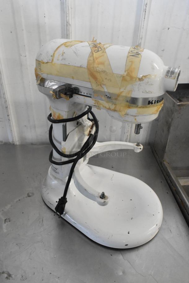 KitchenAid KV25G0XWW/KSMC50S 5 Quart Mixer in used condition, taped for transport. Includes 2 dough hooks and 1 paddle.