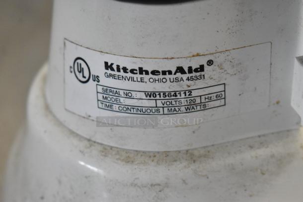 KitchenAid mixer label showing serial number W01564112, 120 volts, and continuous operation details.