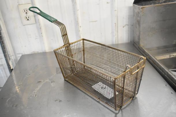Metal fry basket with green handle, rectangular shape, used condition, mesh design for deep frying. Lot of 4 available.