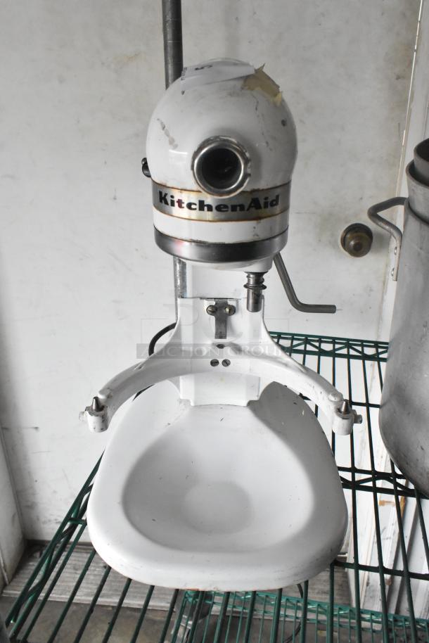 KitchenAid 5 Quart Metal Dough Mixer, Planetary, 115V. Visible wear, KitchenAid branding on unit.
