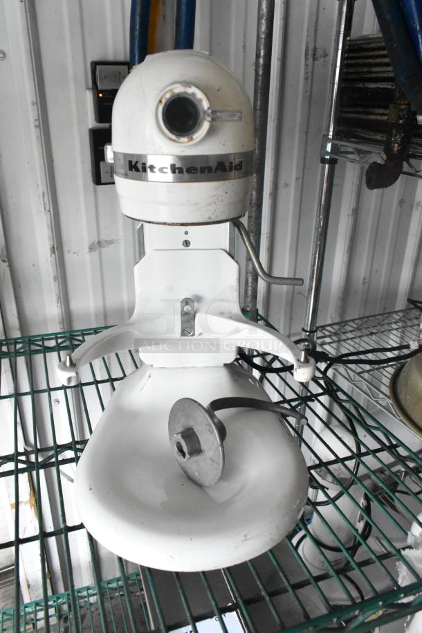 KitchenAid KM25G mixer with dough hook, 5-quart, metal, used condition, 120V, 1 phase, on a wire shelf.
