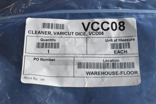 Brand new VCC08/VCD08 Varicut Dice Cleaner in sealed packaging. Label shows warehouse location and quantity as one.