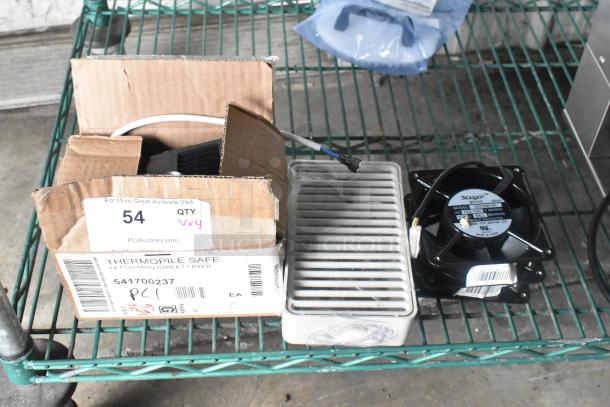 4 items including 2 Maxair BT110 fans, drip tray, and wire on metal shelf. Box labeled "Thermopile Safe."