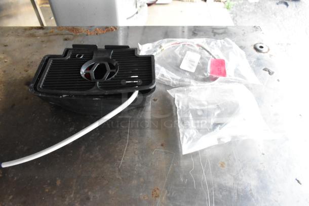 4 items including 2 Maxair BT110 fans, drip tray, and wire; features plastic components, packaged in bags.
