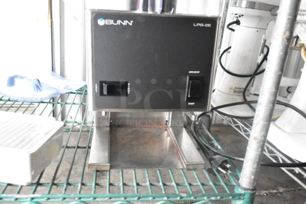 2024 Bunn LPG-2E stainless steel commercial coffee grinder, countertop model, 120 volts, visible control panel with start/stop switches.