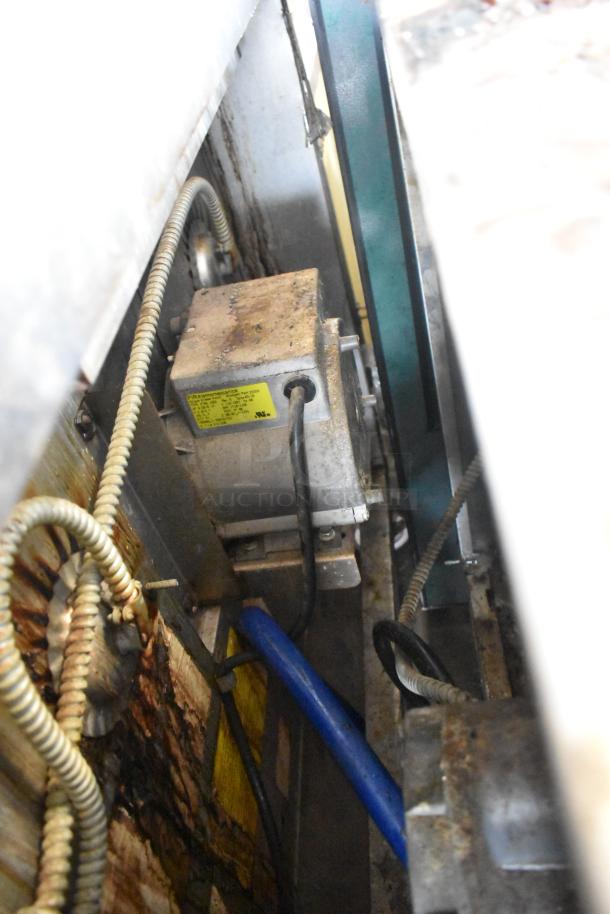 Blodgett commercial gas convection oven internal view with wiring and components visible, showing wear and usage.