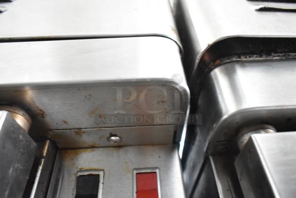 Blodgett stainless steel full-size convection oven, gas-powered, with metal racks and thermostatic controls, on commercial casters.
