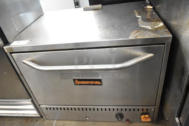 Sierra stainless steel commercial countertop pizza oven, used condition, visible controls, Sierra logo on front.