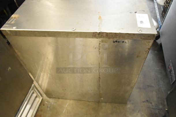 Sierra stainless steel commercial countertop pizza oven, shows signs of use with surface rust and discoloration on top.
