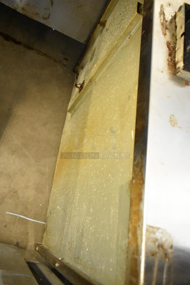 Sierra Stainless Steel Commercial Countertop Pizza Oven, visible wear, rust on surfaces, needs cleaning and maintenance.