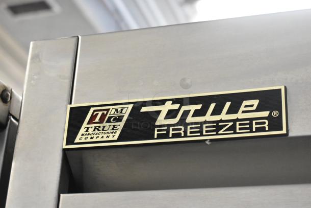 True T-19F stainless steel commercial freezer. Single door, 115 volts, True Manufacturing label visible.