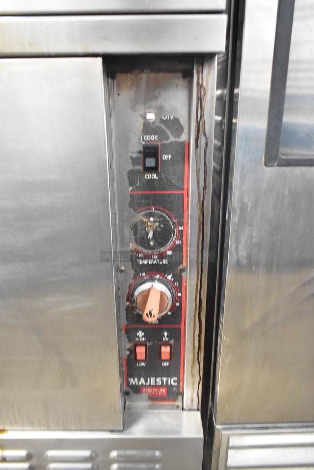 American Range Majestic stainless steel commercial convection oven, solid doors, thermostatic controls, visible wear.
