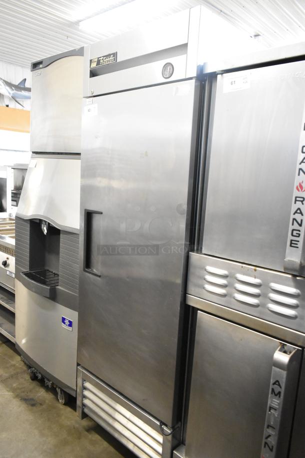 True T-23F stainless steel commercial single door reach-in freezer, 115 volts, 1 phase; visible True branding.