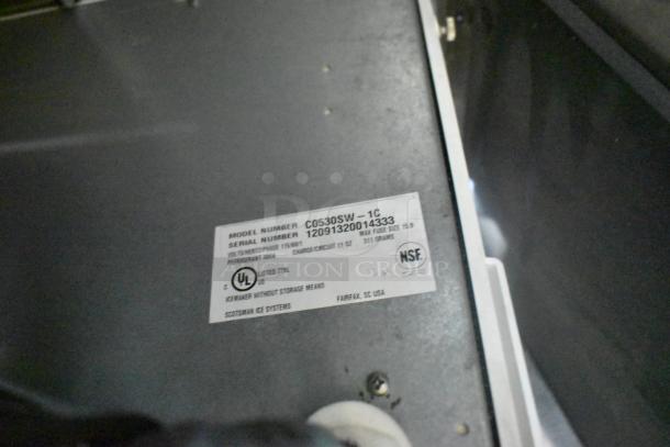 Scotsman Prodigy C0530SW-1C label with serial number, voltage, and certifications on stainless steel ice maker.