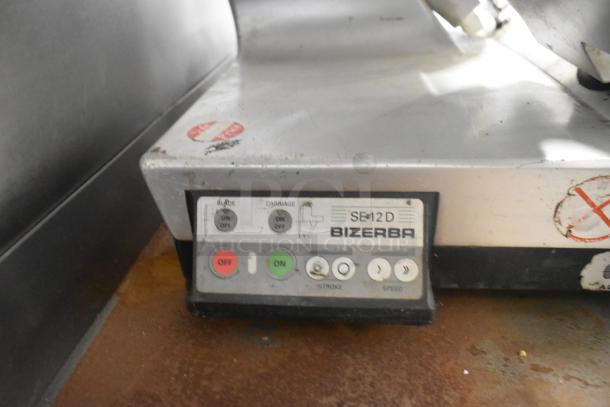 Bizerba SE 12 D US commercial meat slicer, metal, 120V, 1 phase, with visible control panel and stickers. Used condition.