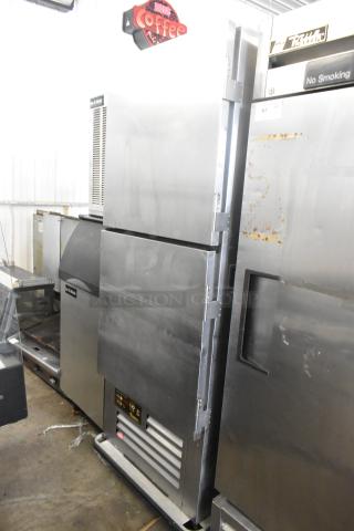 Traulsen RAC-37 stainless steel commercial 2-door reach-in air curtain cooler on casters. 120V, 1 phase. Slight wear visible.