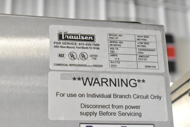 Traulsen RAC-37 stainless steel air curtain cooler, commercial-grade, 2 doors, on casters; 120V, 1 phase; model info displayed.