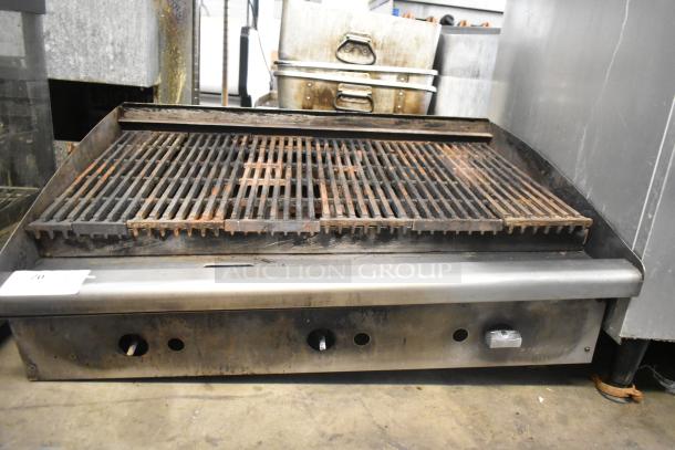 Stainless Steel Commercial Countertop Gas Charbroiler Grill, used, visible wear, adjustable knobs, heavy-duty grates.