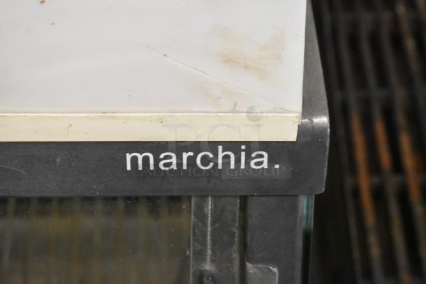 Marchia MHCC136 metal countertop heated display case, 115V, 1 Phase, features visible Marchia branding, condition used.