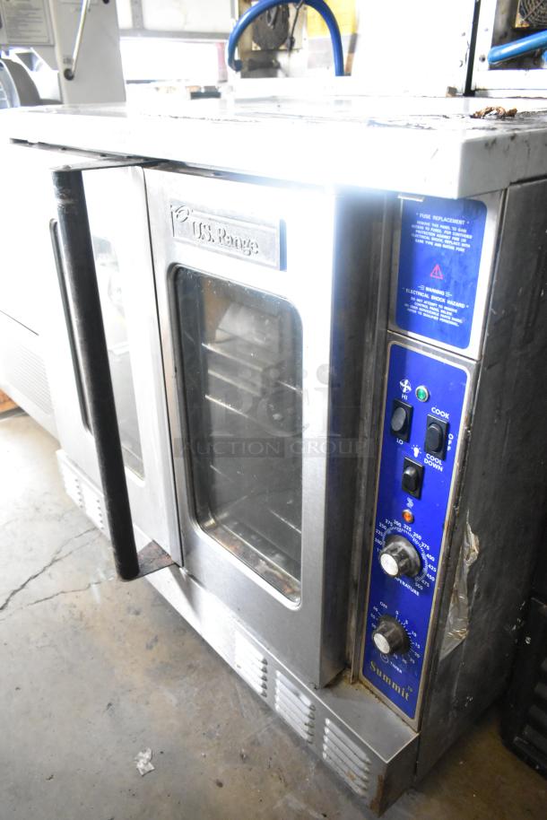 US Range stainless steel convection oven with view-through doors, metal racks, and thermostatic controls.