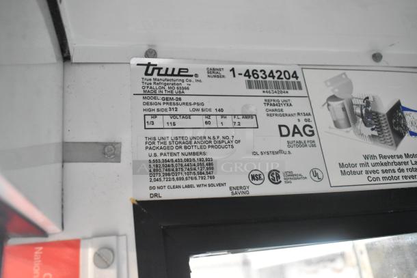 True GEM-26 cooler label showing model details, design pressure, voltage (115V), phase, serial number, and certifications.