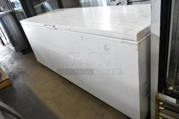 Frigidaire FFFC25M4TW chest freezer with hinge lid, 115V, 1 Phase, minor exterior wear, spacious capacity.